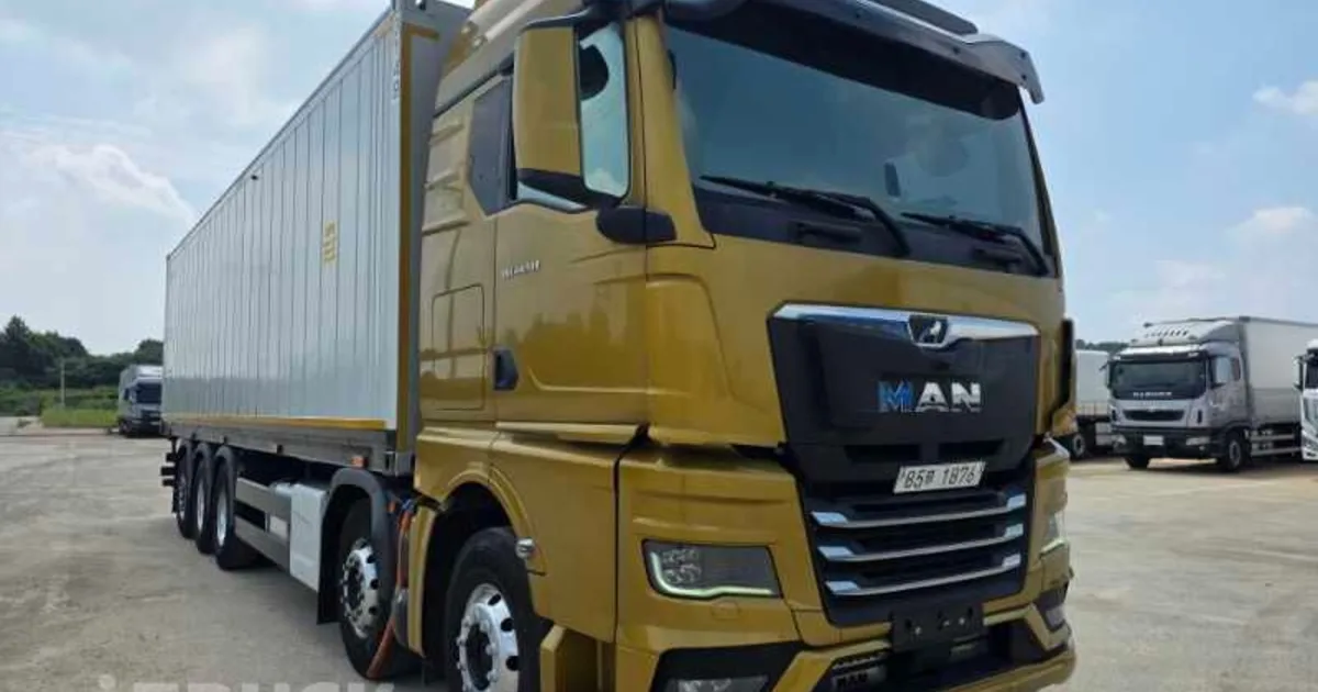 금색 2023년식 만 TGX 510 22톤 냉동 컨테이너탑 사진